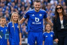 Jamie Vardy and Rebekah Vardy with their children Sofia, Finley, and Olivia on the pitch at Leicester City.