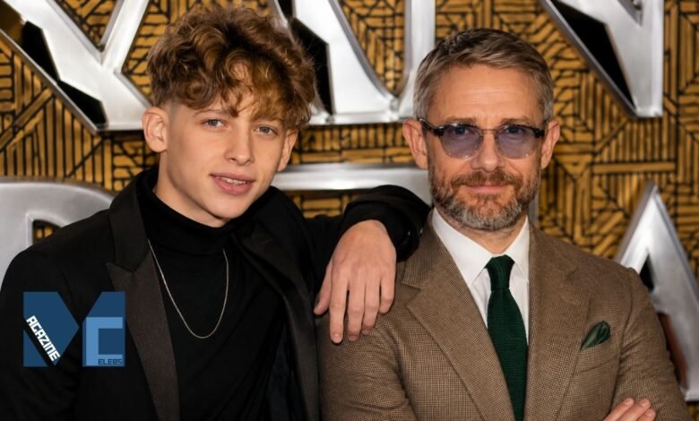 Joe Freeman posing on the red carpet with his father, British actor Martin Freeman.