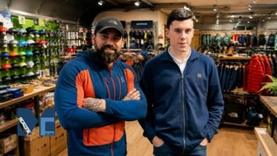 Oakley Middleton standing next to his father, former Special Forces operator Ant Middleton, inside a retail store.