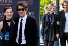 Robie Uniacke and his partner actress Rosamund Pike attending the Olivier Awards and walking together