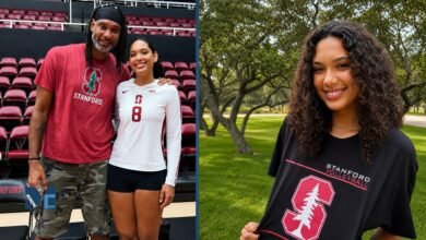 Sidney Duncan, the 6-foot-4 middle blocker for Stanford women's volleyball, pictured in her #8 jersey alongside her father, NBA Hall of Famer Tim Duncan.
