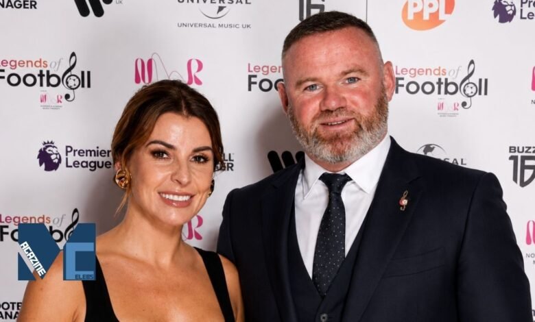 Wayne Rooney and his wife Coleen Rooney smiling together at the Legends of Football event red carpet with Premier League logos in the background.