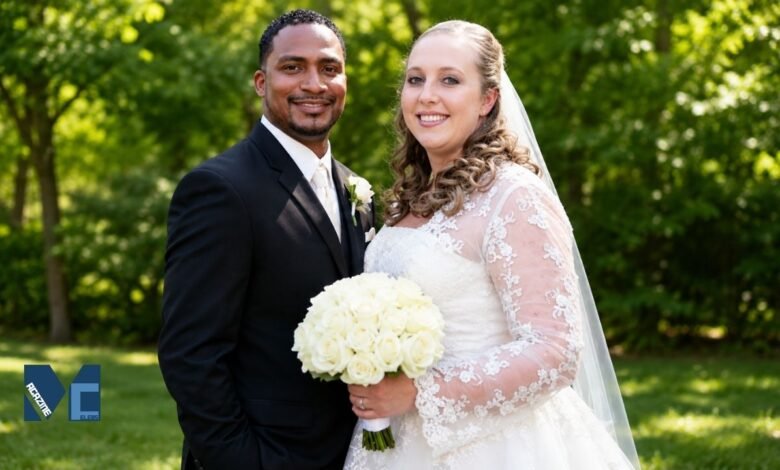 Corrie Bird and Trent Batson posing together during their wedding ceremony in Indiana.