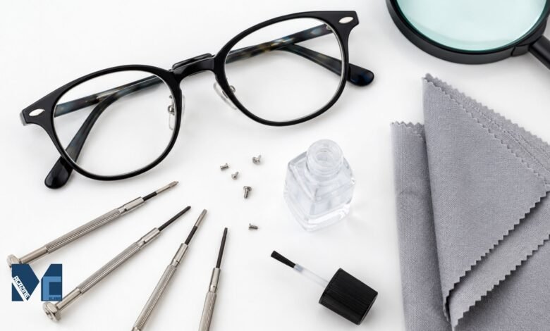 Eyeglass repair kit showing precision screwdrivers, spare screws, nail varnish, microfibre cloth, and glasses on a white surface for fixing loose eyeglasses at home.