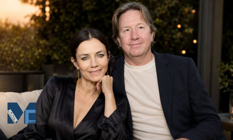 Real estate finance executive Mark Fluent and his wife, actress Justine Bateman, sitting together and smiling in a relaxed outdoor setting.