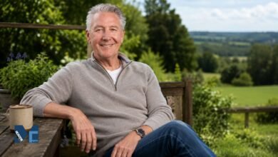 Tommy Walsh sitting outdoors in a countryside garden setting, known for Ground Force and Homes Under the Hammer.